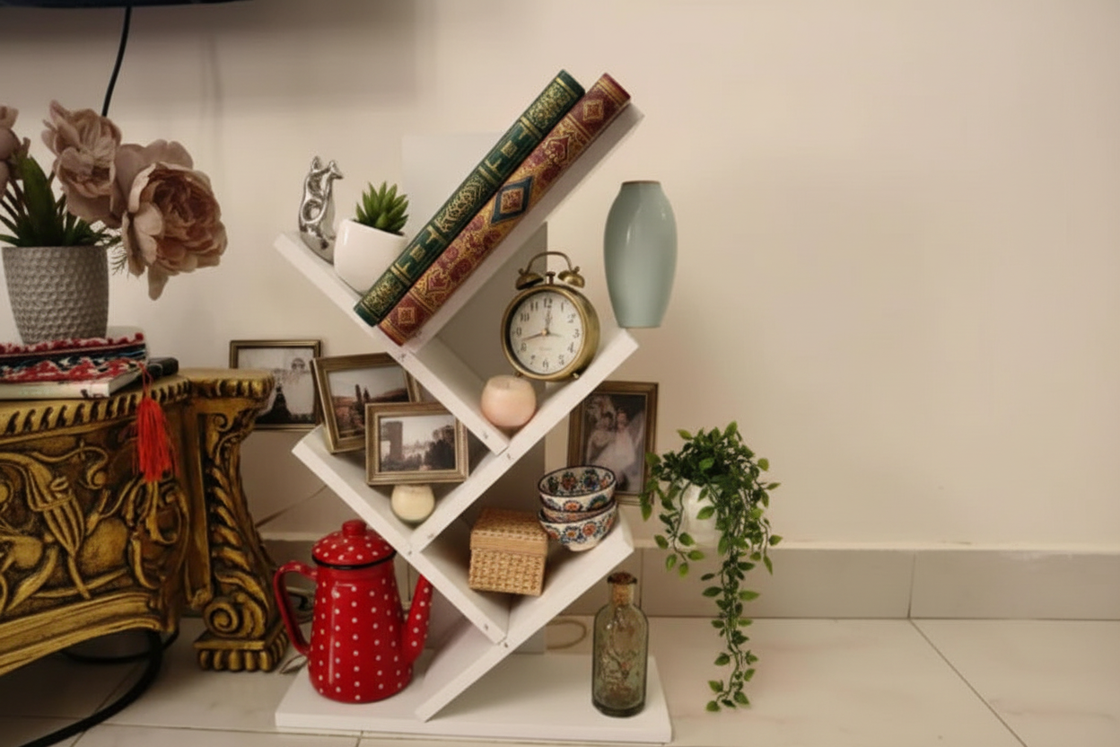 White bookshelf with books and decorative items on a light-colored floor.